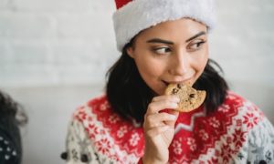 holidays, stress, eating cookie, cookies, santa hat